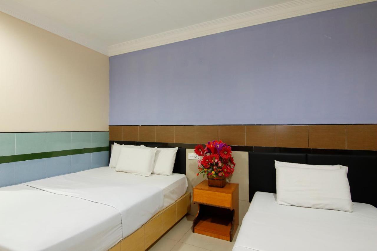 Cosy Inn Miri Esterno foto